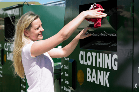 Woman donating cloths image