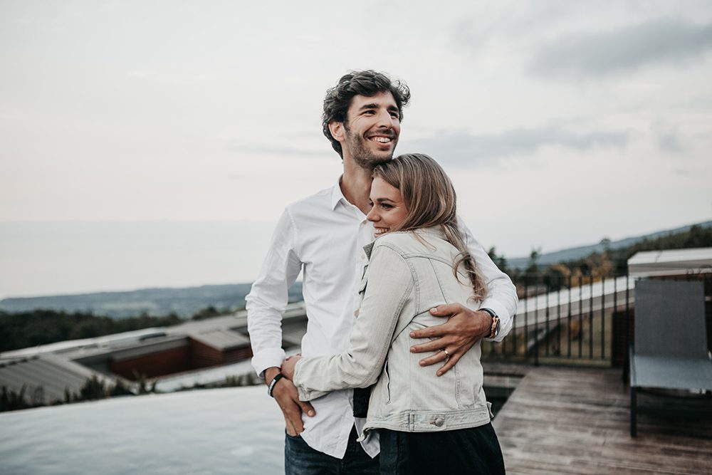 image of a couple hugging outdoors